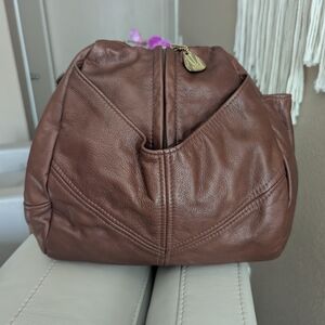 Victoria Leather Co. handbag, often referred to as "The Original Teardrop Leathe